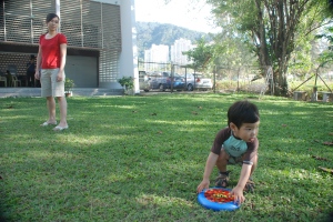 Jojo plays frisbee